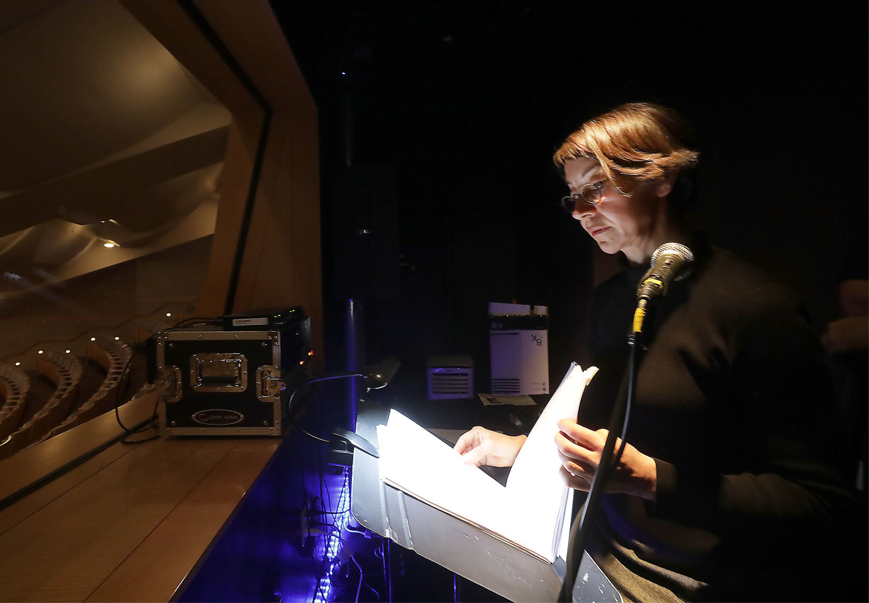 Kelly Warren looking over script